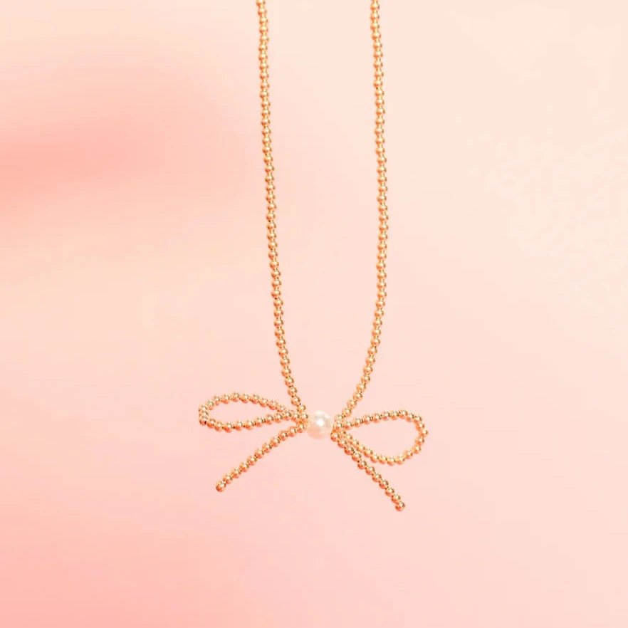 Beaded Blondes | Gold Bow Necklace with Pearl Accent - bestdisneylandrvpark