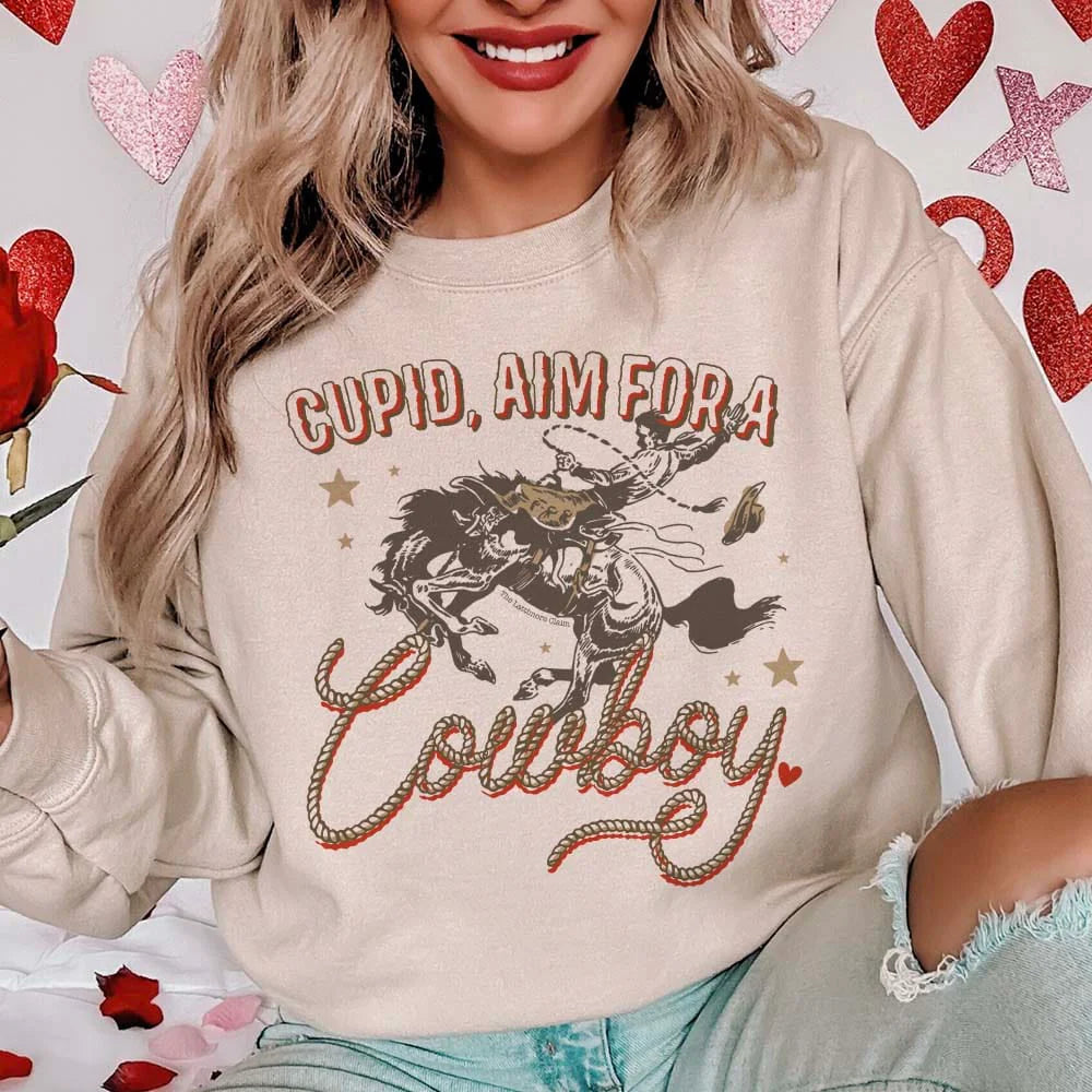 Online Exclusive | Cupid, Aim For A Cowboy Long Sleeve Graphic Sweatshirt in Cream - bestdisneylandrvpark